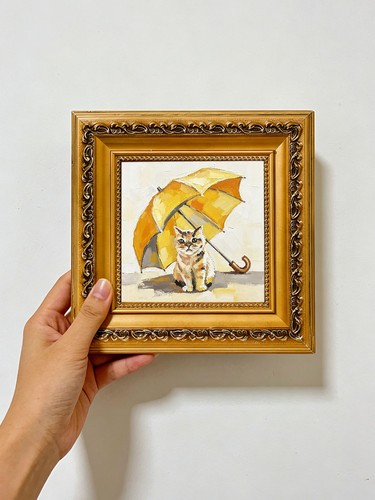Calico cat sitting under - sitting,
