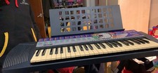 Blue Yamaha keyboard PSR 74