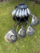 NICE SET OF MENS GOLF CLUBS. COBRA WOODS, BRAND NEW IRONS. STAND BAG. FREE POST