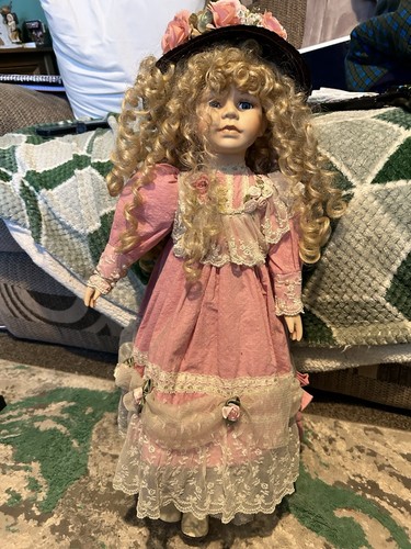 Vinyl doll with long - long, curly