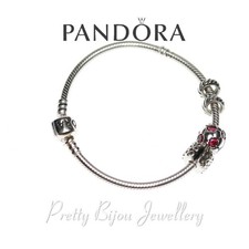Pandora Bracelet with Four Genuine Pandora Charms
