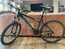 Rockrider Btwin 340 black bike. "Sloped" unisex frame geometry. 19.5" frame.