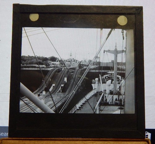 Antique glass slide merchant - glass,