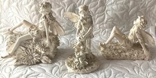 Three charming distressed look Gisela Graham resin fairy figures
