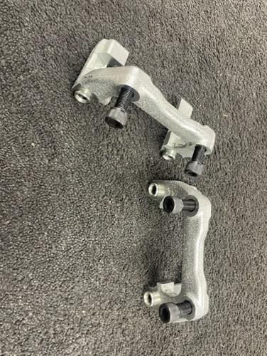 Rear brake caliper bracket - caliper,