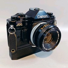 Canon A1 35mm SLR Film Camera With 50mm f1.8 FD Lens And Canon Power Winder 