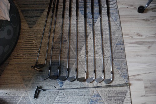 Various golf clubs