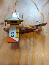 small tin plate plane