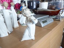 Lladro angel  girl playing