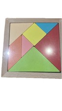 Wooden puzzle. Coloured wooden tangram puzzle game 7 pieces intelligence game