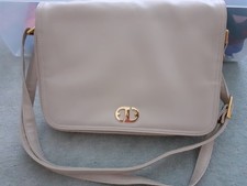 ladies oyster cream handbag
