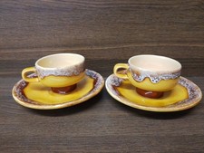 Two Honiton Pottery Cups And Saucers 