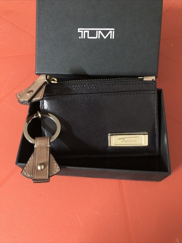 Tumi black leather - black,