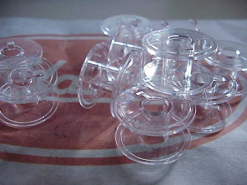Sewing machine bobbins to - machine,