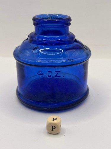 Old blue glass ink bottle