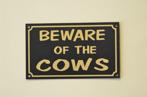 Beware the cows sign or - cows,