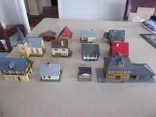 12 TT scale model railway buildings, mostly plastic continental models, fair