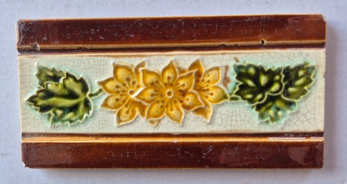 Antique fireplace spacer tile