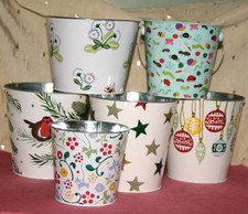 SIX METAL PLANT POT HOLDERS