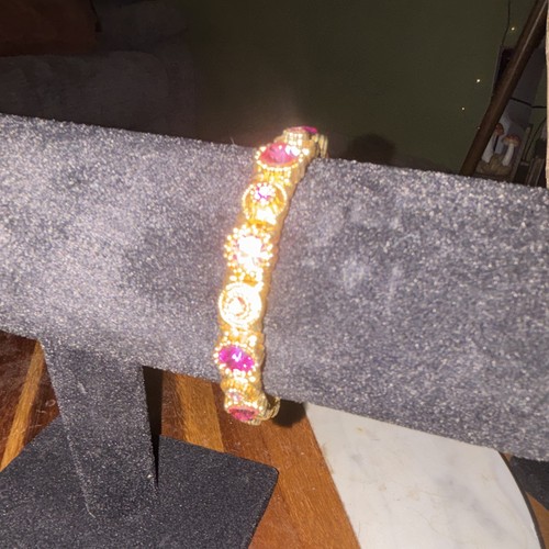 Gold tone bangle bracelet - tone,