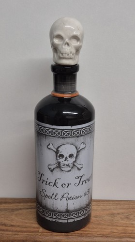 Black ceramic potion bottle
