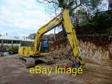 Photo 6x4 Komatsu pc130 digger