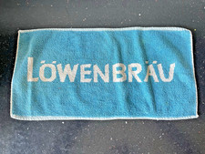 LOWENBRAU Used Cotton Bar Towel 46cms X  23cms Couple Of Marks On Back Of Towel