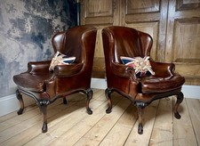 PAIR of ANTIQUE TAN LEATHER CARVED CHESTERFIELD WINGBACK LIBRARY ARTFORMA CHAIRS