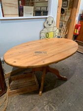 Oval pine tilt top table