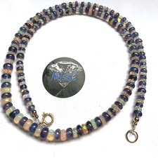 9CT GOLD TANZANITE AND FIRE