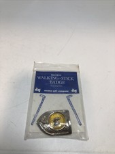 souvenir walking stick badge