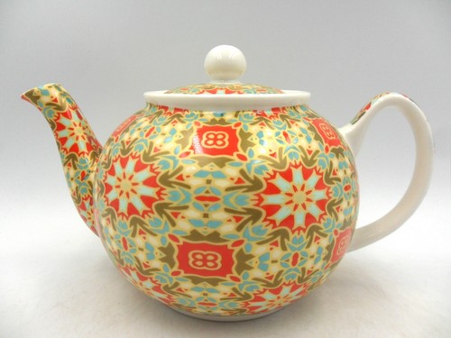 Cup teapot in - cup, golden