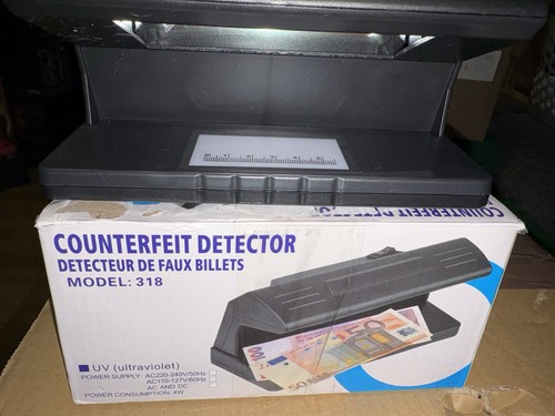 Counterfeit money detector - counterfeit,