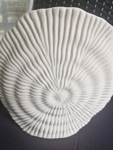 Shell vase hand made can - made.,