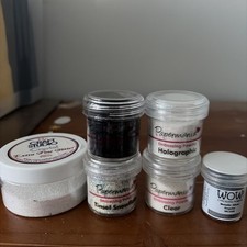 6 pots of  Embossing Powder -
