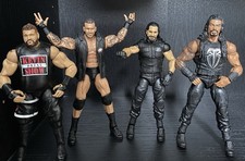 WWE Elite Series Figure & Championship Belt Bundle Including 4 Figures & 2 Belts