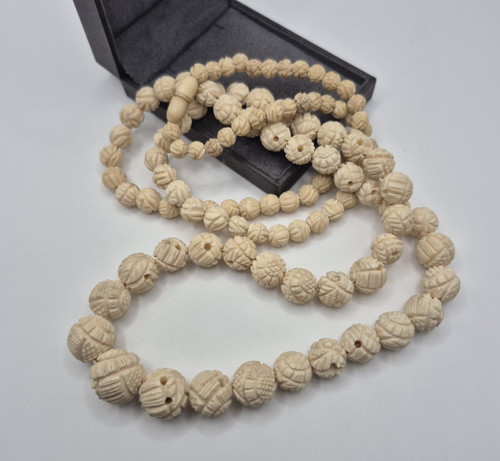 Carved celluloid beaded