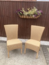 Two Lloyd Loom dining/occasional Chairs