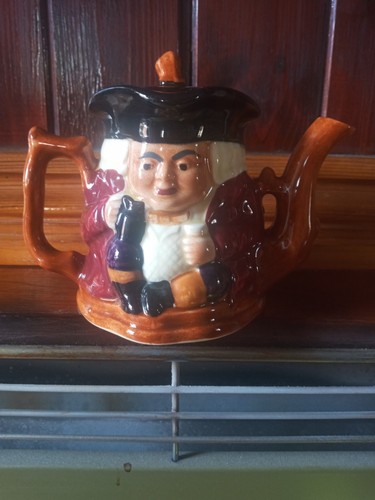 Two faced toby teapot never - two, teapot.never