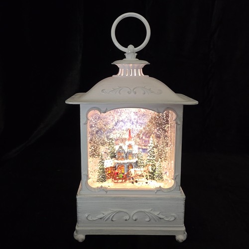 Swirling glitter snow globe - swirling,