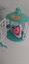 Little live pets. Birds in cag7e toy