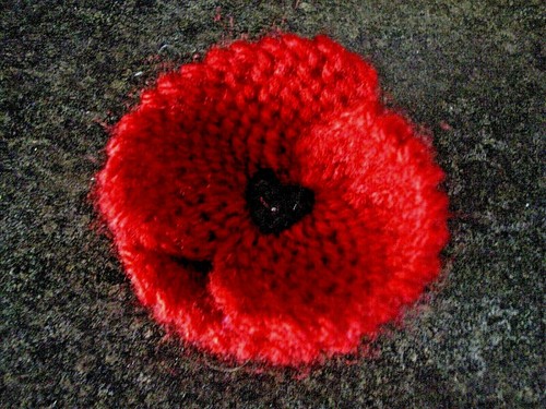 Knitted red poppy brooch - *knitted, pin