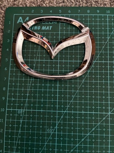 Mazda front bumper - bumper, badge