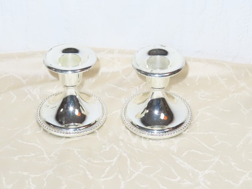 Pair silver metal round candle - pair,
