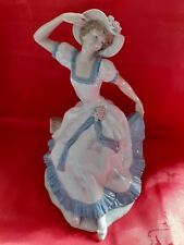 A Nao figure of a seated