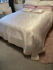 Large cream satin bedspread /