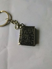 SILVER COLOURED HOLY BIBLE /