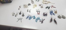 21 Pairs Of Costume Earrings  Rings And Bracelet