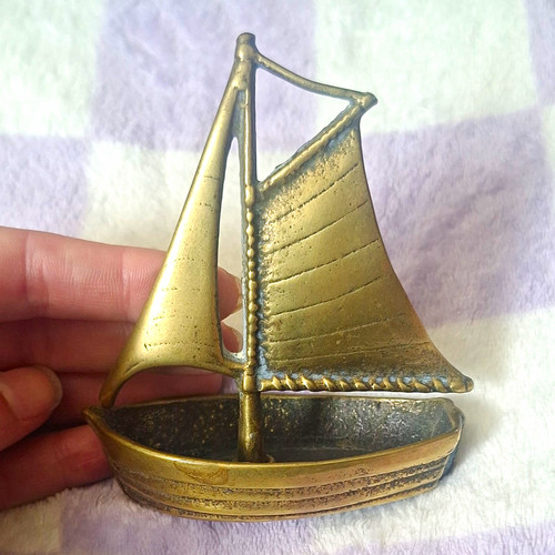 Brass sailing boat - sailing,