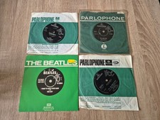 4 X 7" VINYL SINGLE RECORDS "